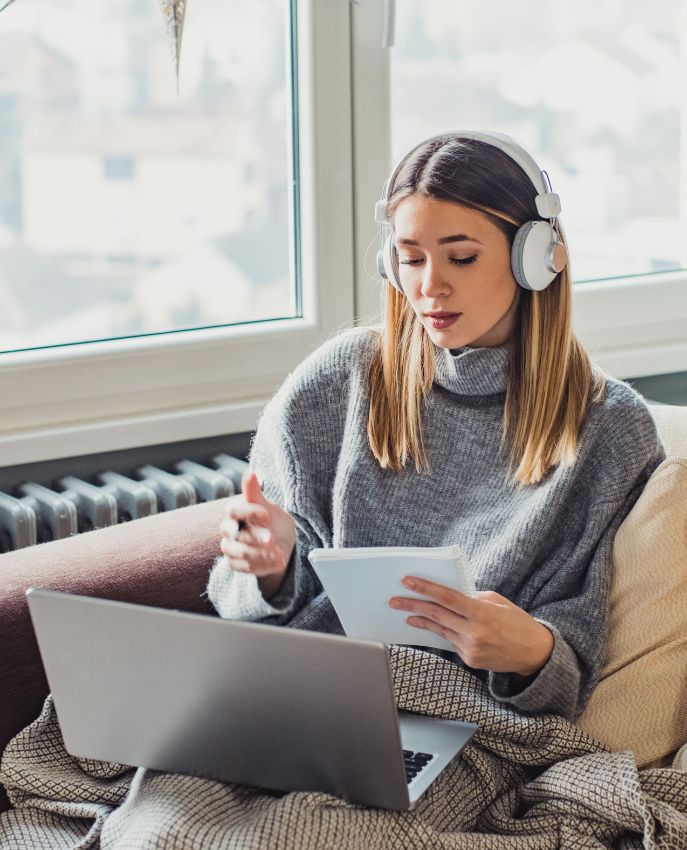 A Girl Wearing Headphones And Learning Texas CE Course