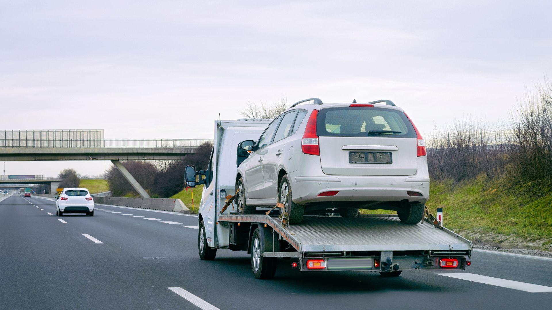 Car Being Transported On A Tow Truck