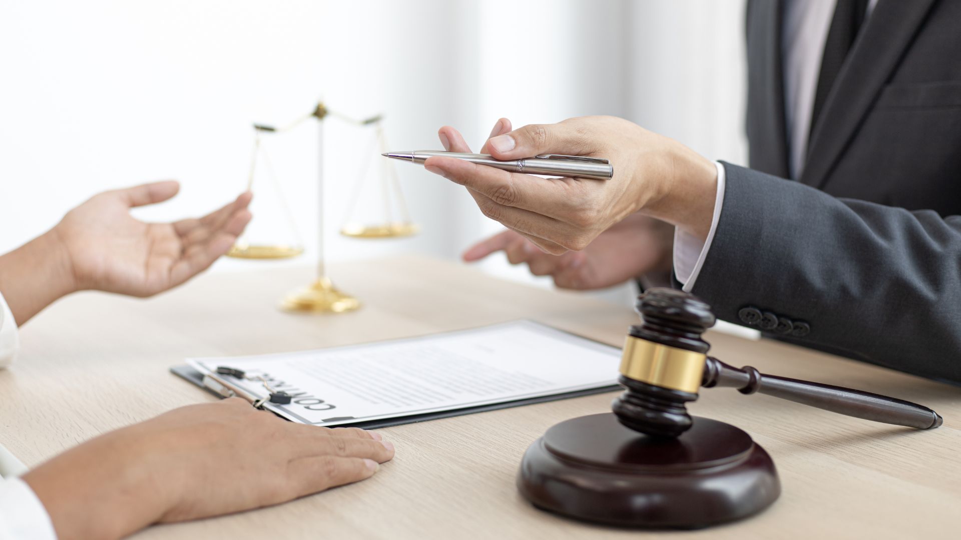 Lawyer Discussing Legal Documents With A Client